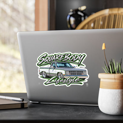 Chevy squarebody sticker showing a slammed 1980s C10 in silver and white with green pinstripes on polished billet wheels, kiss-cut vinyl decal by Drippn Ink