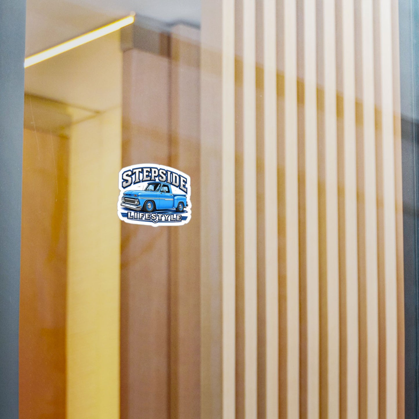 Chevy C10 stepside sticker showing a slammed 1960s truck in bright blue with chrome bumpers and blue steel wheels, kiss-cut vinyl decal by Drippn Ink