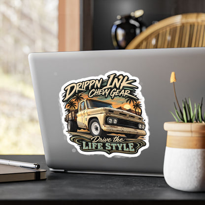 Chevy C20 dually flatbed sticker showing a 1964 truck with wooden stake sides and rust against an Arizona desert sunset with palms, kiss-cut vinyl decal by Drippn Ink