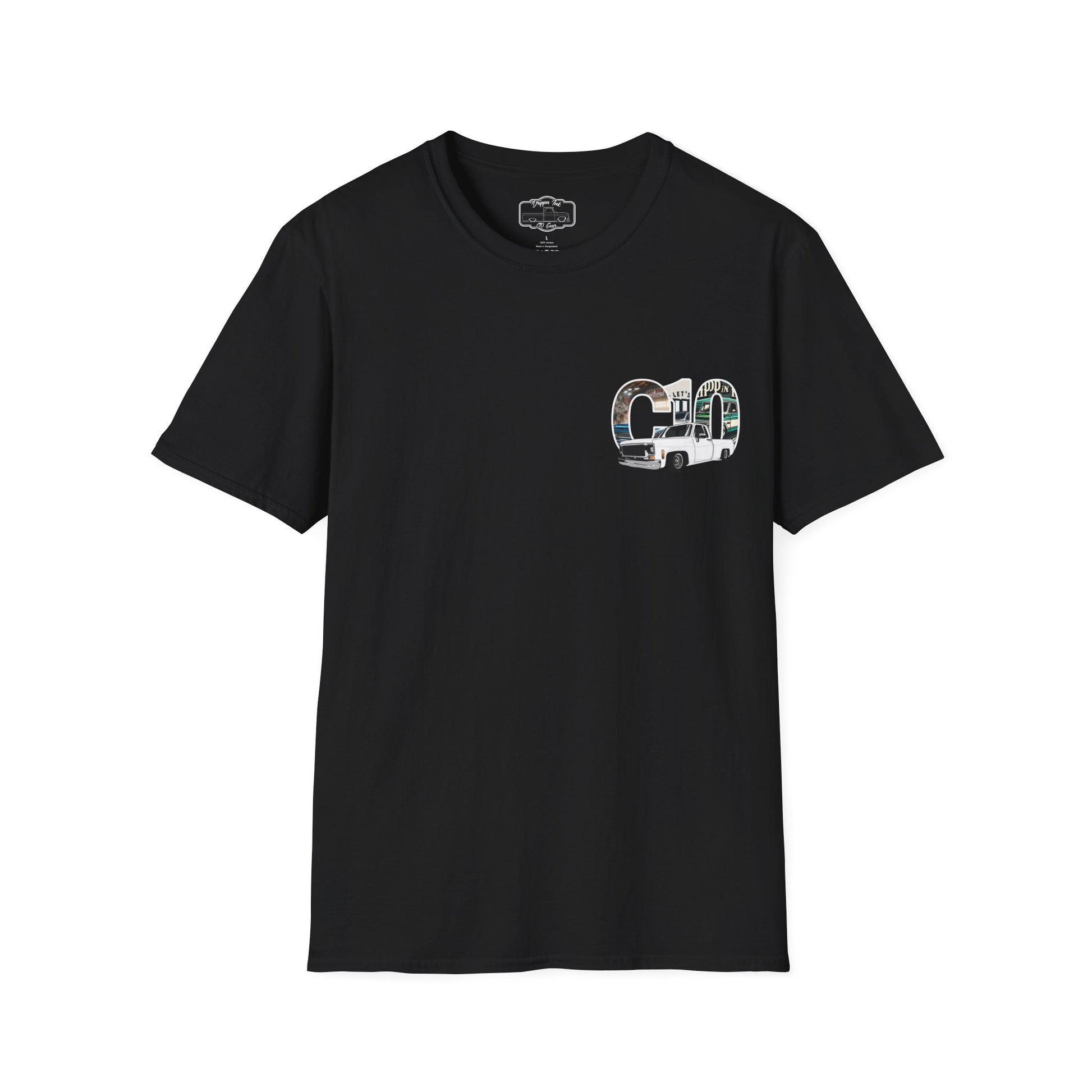 Black t-shirt laid flat, front view, with a small chest print of the letters C10 filled with a garage scene and a white pickup truck.
