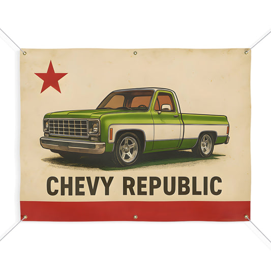 Cream fabric banner with corner grommets, a red star in the top left, a green and white squarebody pickup truck in the centre, and Chevy Republic in block letters over a red bar.