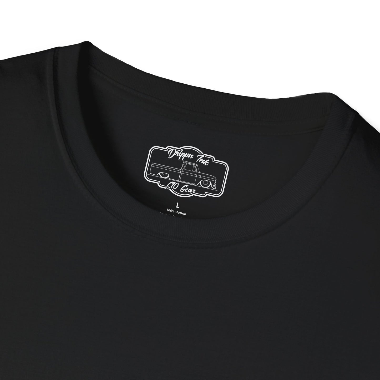 Close view of the shirt's inside neck label, a printed Drippn Ink C10 Gear badge on black fabric.