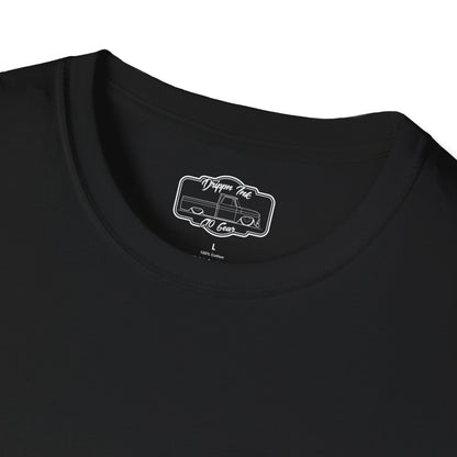 Close view of the shirt's inside neck label, a printed Drippn Ink C10 Gear badge on black fabric.