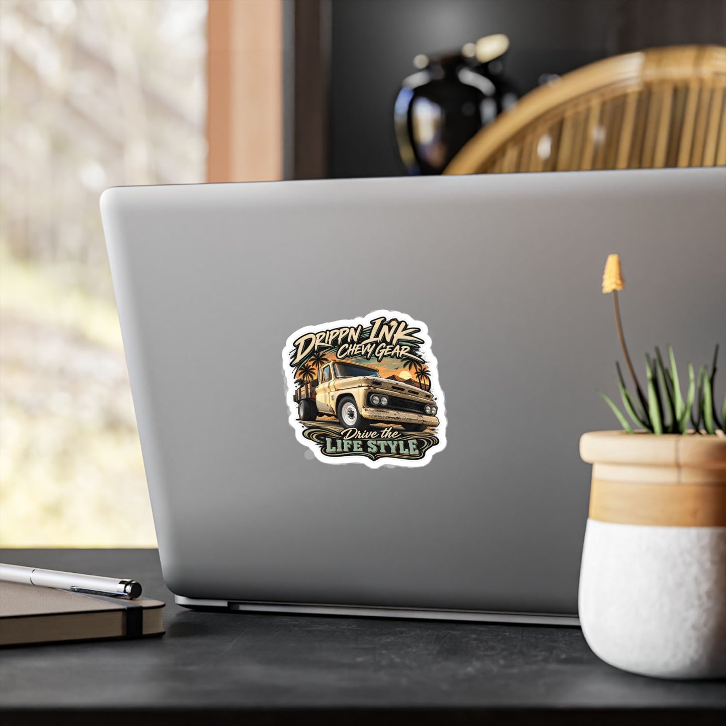Chevy C20 dually flatbed sticker showing a 1964 truck with wooden stake sides and rust against an Arizona desert sunset with palms, kiss-cut vinyl decal by Drippn Ink