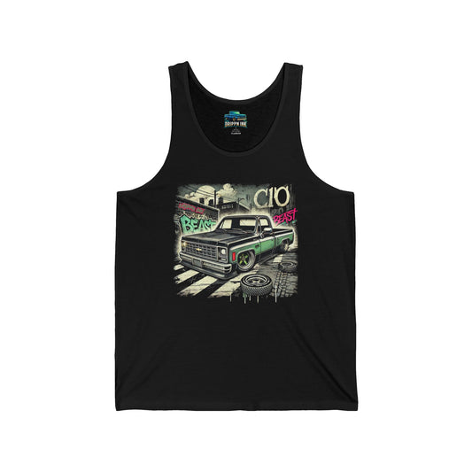 Black tank top featuring a graffiti-style green Chevy C10 Squarebody with “C10” and “Beast” tags on a street scene background.