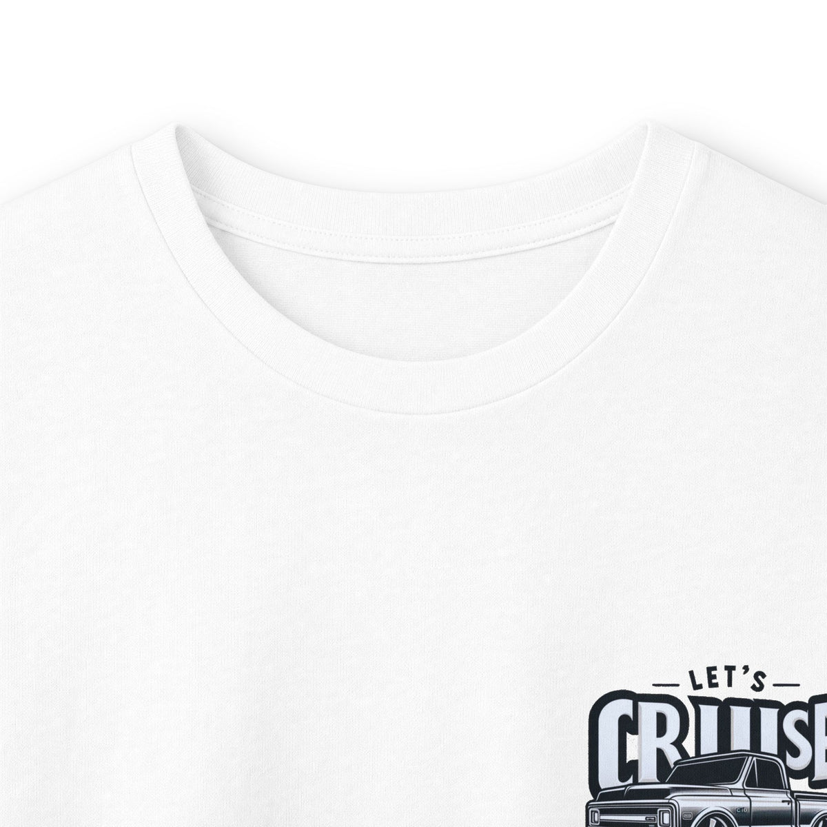 Close up of the white long sleeve tee showing the LET'S CRUISE chest badge and pickup artwork