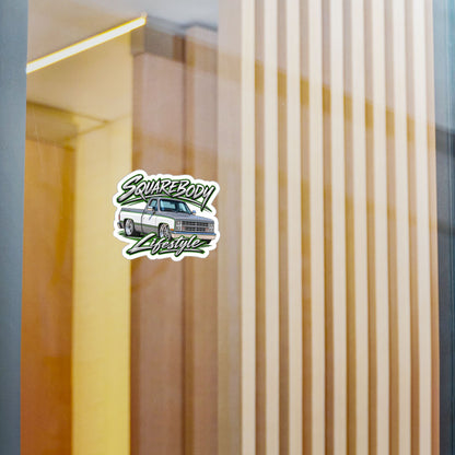 Chevy squarebody sticker showing a slammed 1980s C10 in silver and white with green pinstripes on polished billet wheels, kiss-cut vinyl decal by Drippn Ink