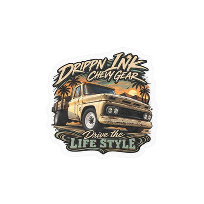 Chevy C20 dually flatbed sticker showing a 1964 truck with wooden stake sides and rust against an Arizona desert sunset with palms, kiss-cut vinyl decal by Drippn Ink