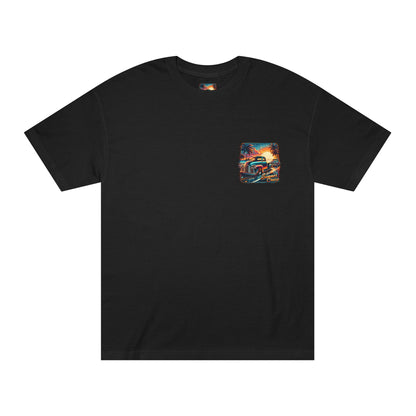Front of the black t-shirt with a small left chest print of the same beach sunset and classic pickup scene.