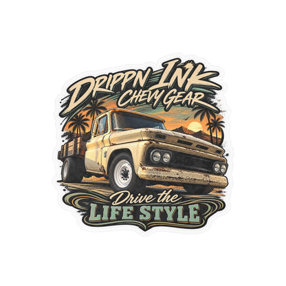Chevy C20 dually flatbed sticker showing a 1964 truck with wooden stake sides and rust against an Arizona desert sunset with palms, kiss-cut vinyl decal by Drippn Ink