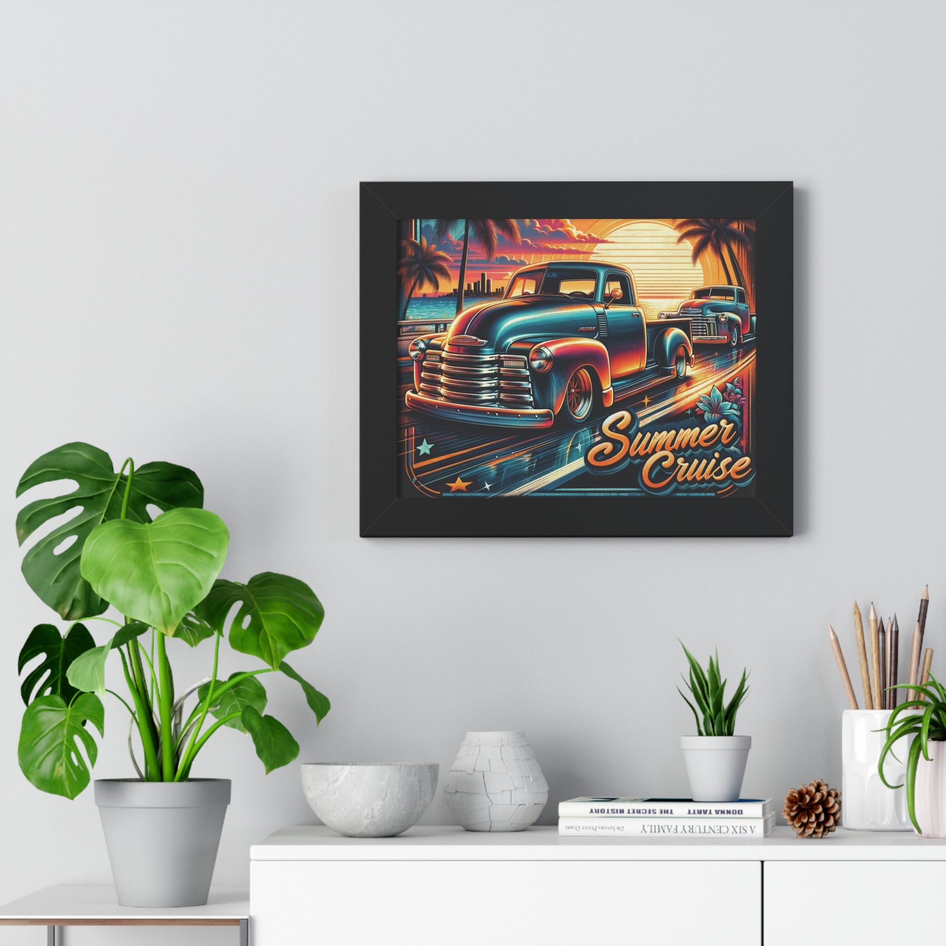 This vibrant and nostalgic poster, titled "Summer Cruise," features a classic car scene with two vintage trucks cruising along a coastal highway during a picturesque sunset. The design radiates a retro vibe with its vivid colors, stylized palm trees, and a city skyline in the background. The sunset casts a warm glow, enhancing the glossy finish of the trucks. The artwork is adorned with playful stars and tropical flowers, emphasizing a carefree summer spirit.