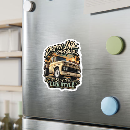 Chevy C20 dually flatbed sticker showing a 1964 truck with wooden stake sides and rust against an Arizona desert sunset with palms, kiss-cut vinyl decal by Drippn Ink