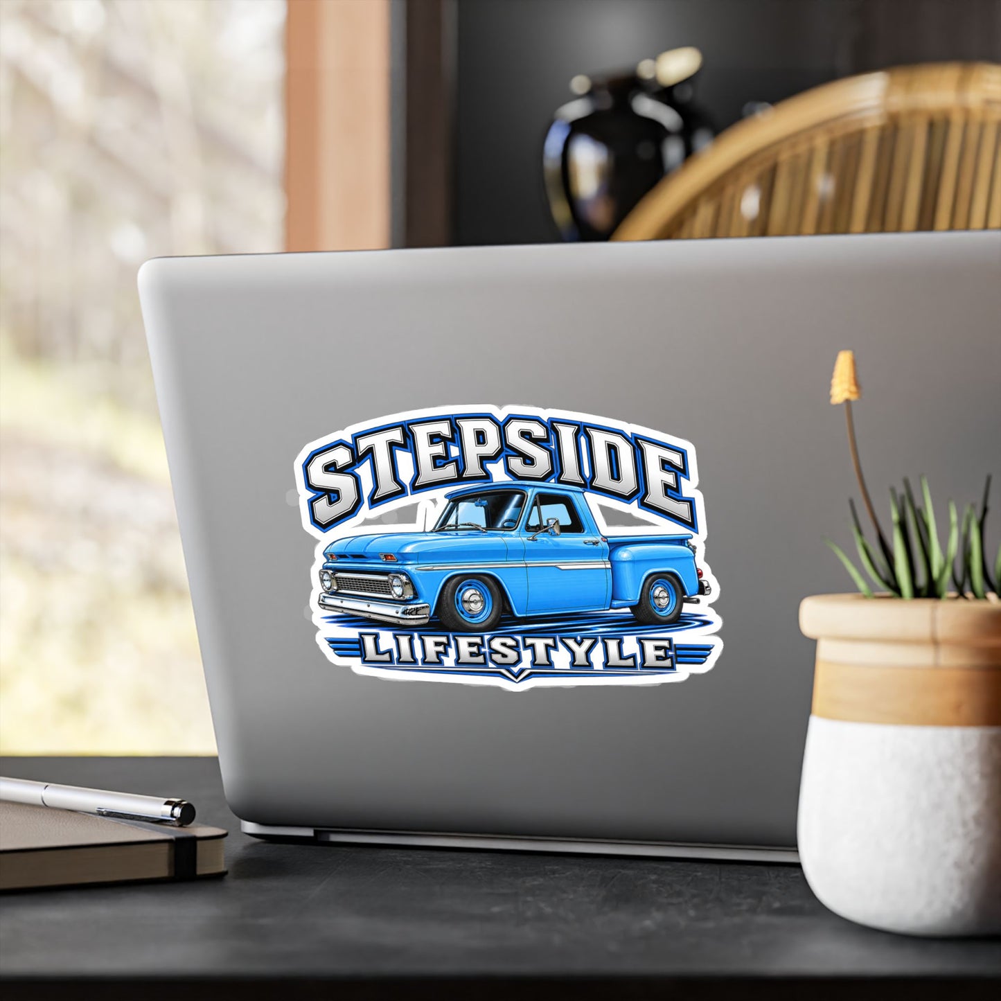 Chevy C10 stepside sticker showing a slammed 1960s truck in bright blue with chrome bumpers and blue steel wheels, kiss-cut vinyl decal by Drippn Ink