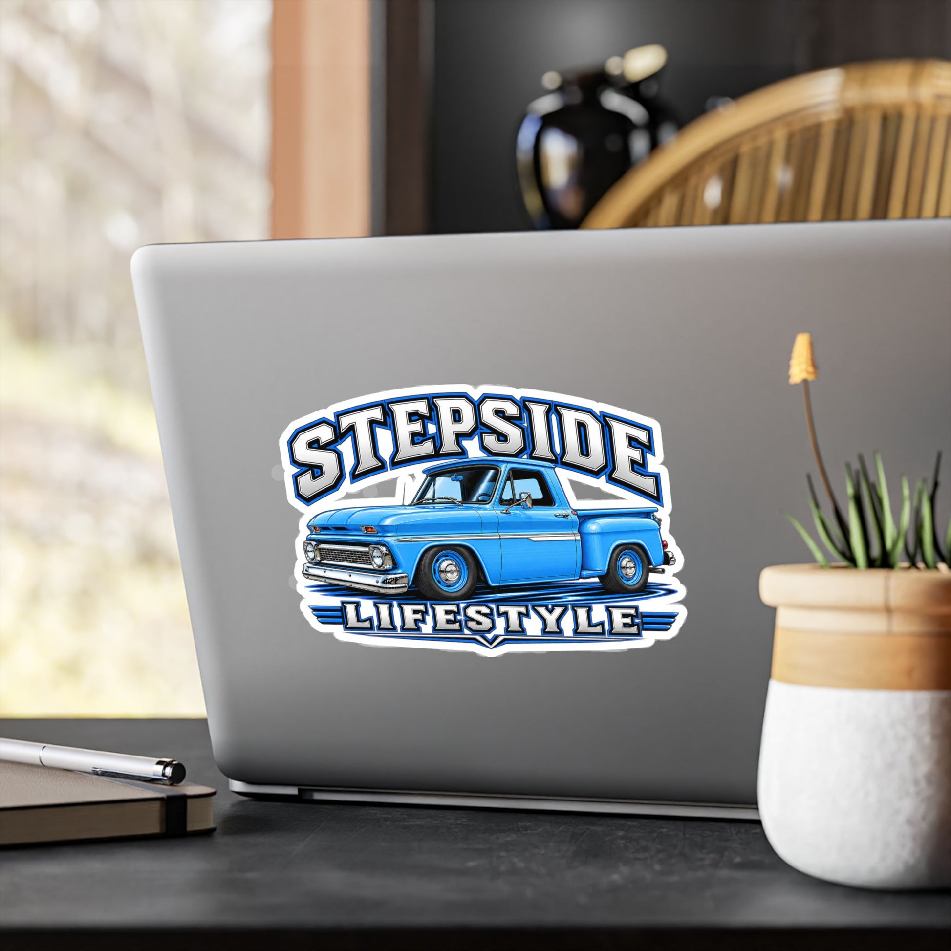 Chevy C10 stepside sticker showing a slammed 1960s truck in bright blue with chrome bumpers and blue steel wheels, kiss-cut vinyl decal by Drippn Ink