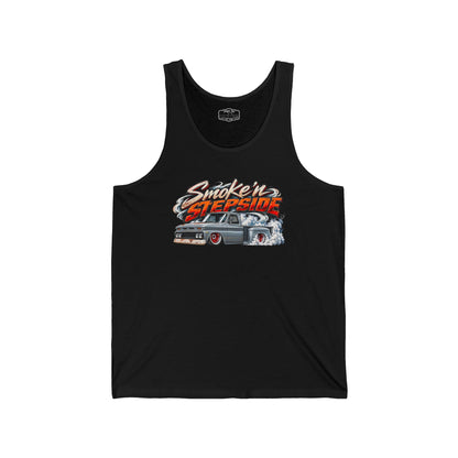 Front of a black Smoke'n Stepside tank top with a graphic of a slammed patina Chevy stepside pickup doing a burnout