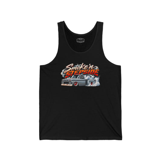 Front of a black Smoke'n Stepside tank top with a graphic of a slammed patina Chevy stepside pickup doing a burnout