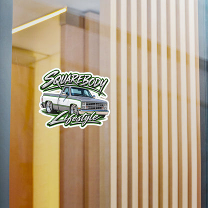Chevy squarebody sticker showing a slammed 1980s C10 in silver and white with green pinstripes on polished billet wheels, kiss-cut vinyl decal by Drippn Ink