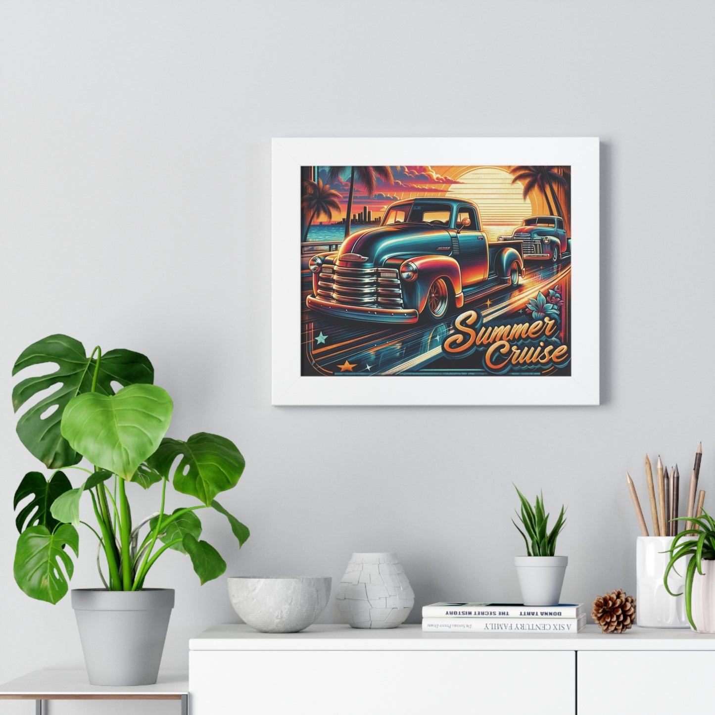 This vibrant and nostalgic poster, titled "Summer Cruise," features a classic car scene with two vintage trucks cruising along a coastal highway during a picturesque sunset. The design radiates a retro vibe with its vivid colors, stylized palm trees, and a city skyline in the background. The sunset casts a warm glow, enhancing the glossy finish of the trucks. The artwork is adorned with playful stars and tropical flowers, emphasizing a carefree summer spirit.