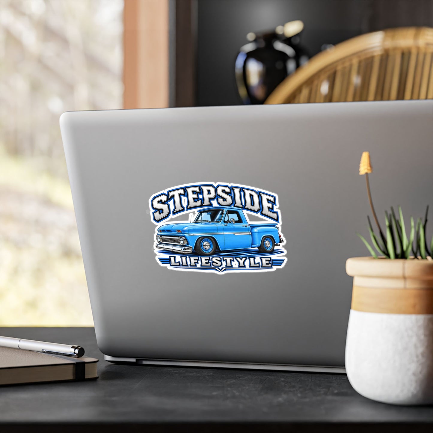 Chevy C10 stepside sticker showing a slammed 1960s truck in bright blue with chrome bumpers and blue steel wheels, kiss-cut vinyl decal by Drippn Ink