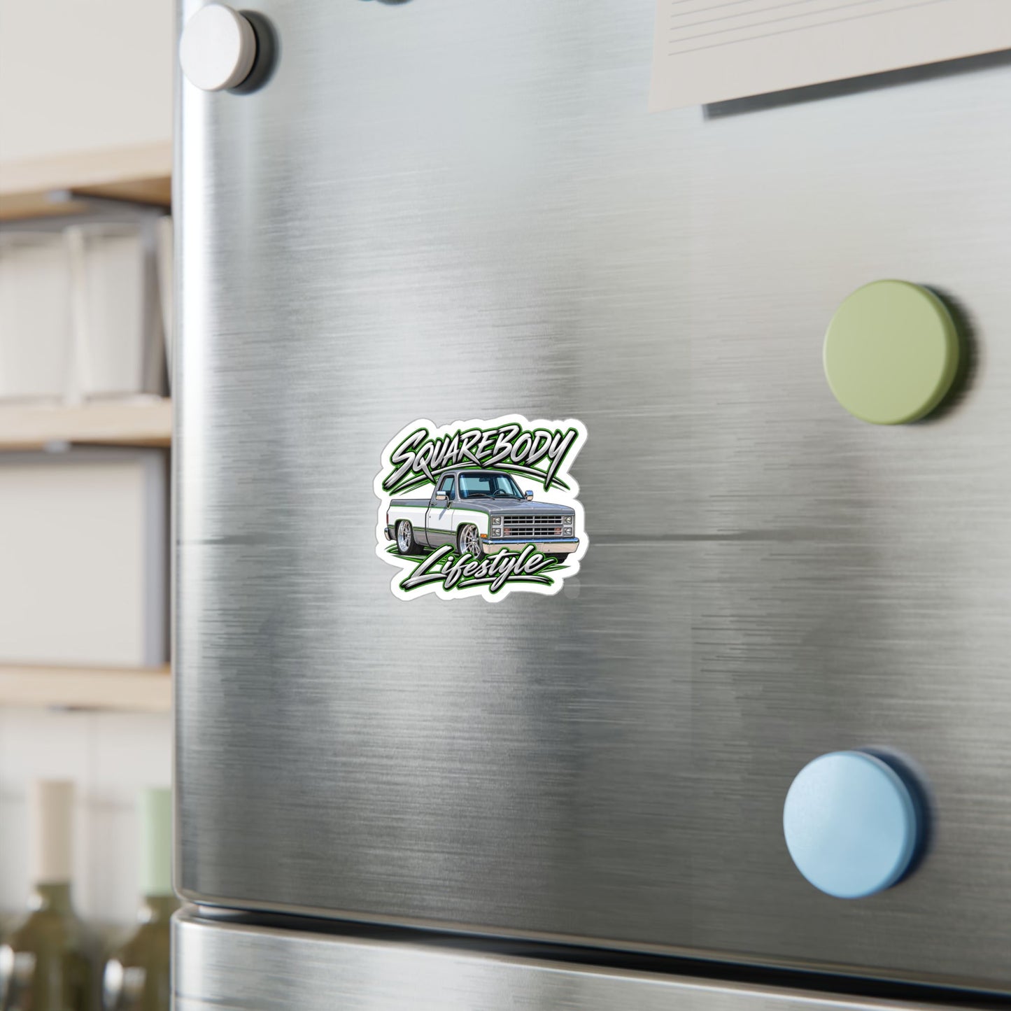 Chevy squarebody sticker showing a slammed 1980s C10 in silver and white with green pinstripes on polished billet wheels, kiss-cut vinyl decal by Drippn Ink