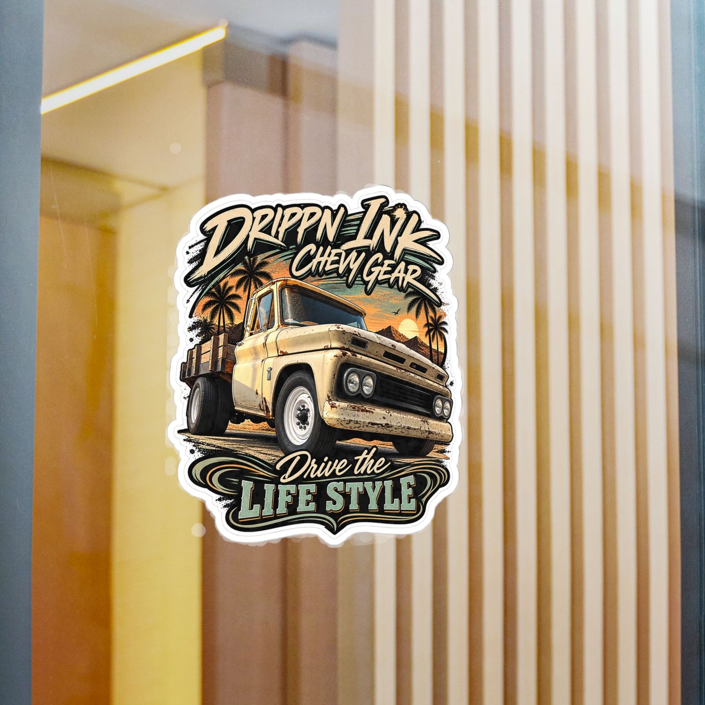 Chevy C20 dually flatbed sticker showing a 1964 truck with wooden stake sides and rust against an Arizona desert sunset with palms, kiss-cut vinyl decal by Drippn Ink