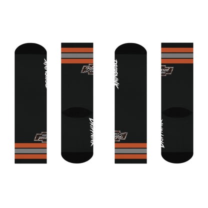 Blessed OBS crew socks featuring Chevy truck inspired logo with orange and silver racing stripes on black fabric.