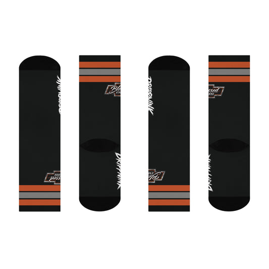 Blessed OBS crew socks featuring Chevy truck inspired logo with orange and silver racing stripes on black fabric.