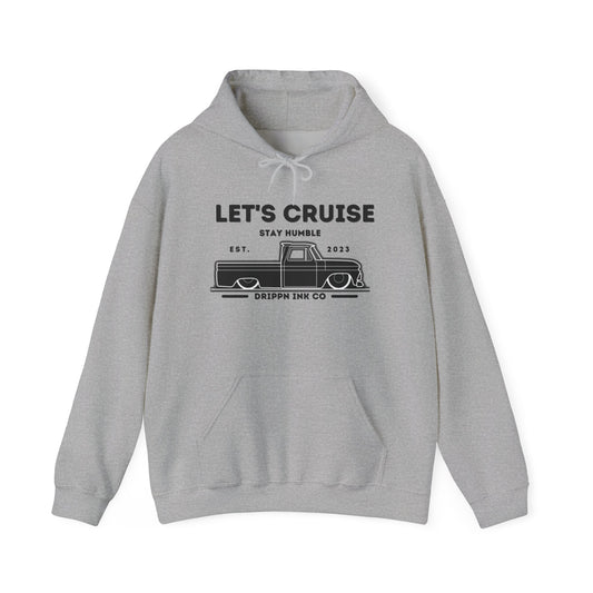 Sport grey hooded sweatshirt with a chest print reading LET'S CRUISE above STAY HUMBLE, a slammed Chevy C10 pickup in line art and DRIPPN INK CO beneath
