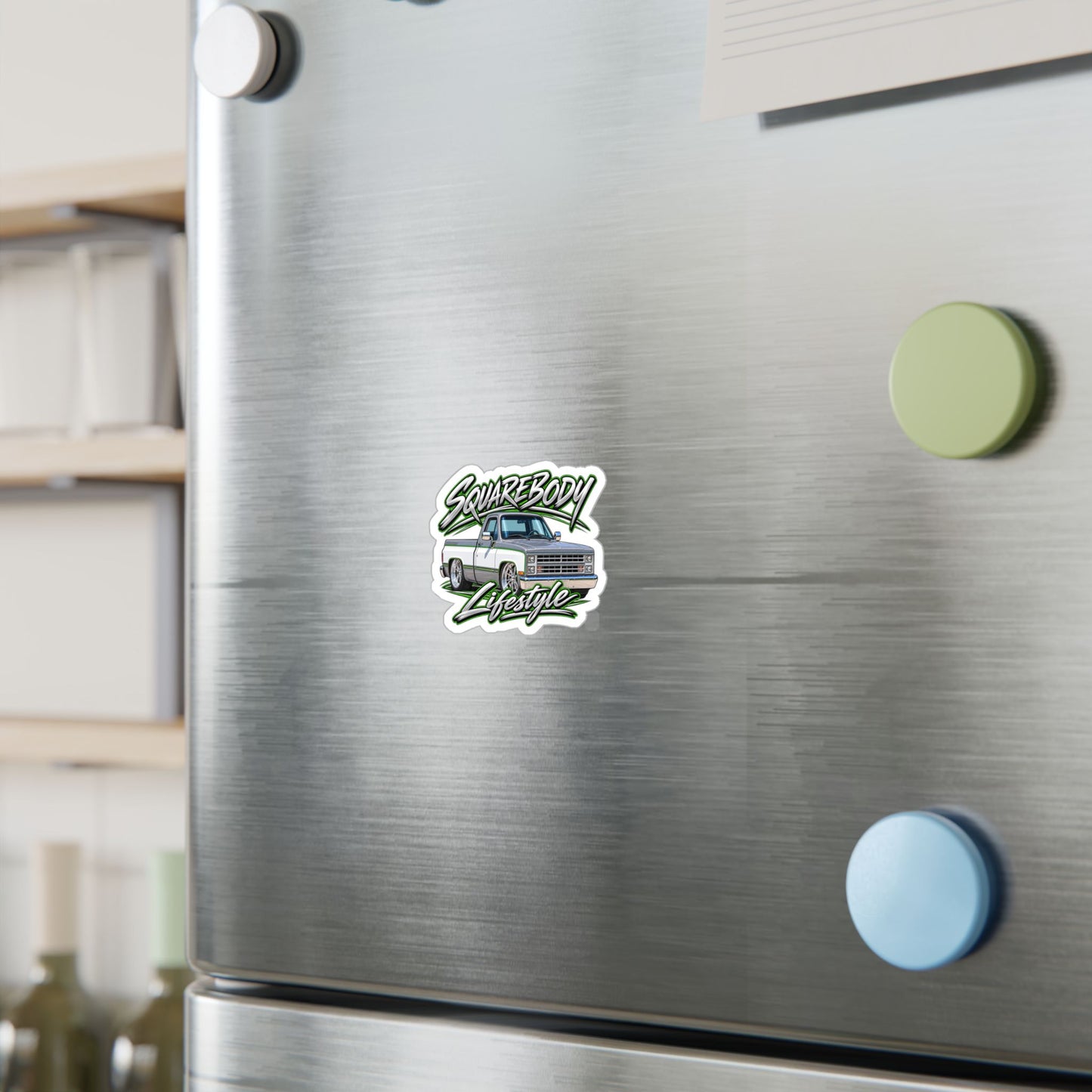 Chevy squarebody sticker showing a slammed 1980s C10 in silver and white with green pinstripes on polished billet wheels, kiss-cut vinyl decal by Drippn Ink