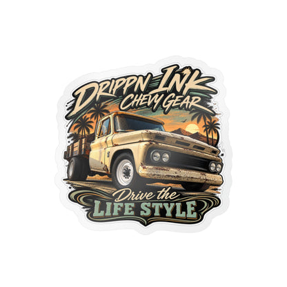 Chevy C20 dually flatbed sticker showing a 1964 truck with wooden stake sides and rust against an Arizona desert sunset with palms, kiss-cut vinyl decal by Drippn Ink